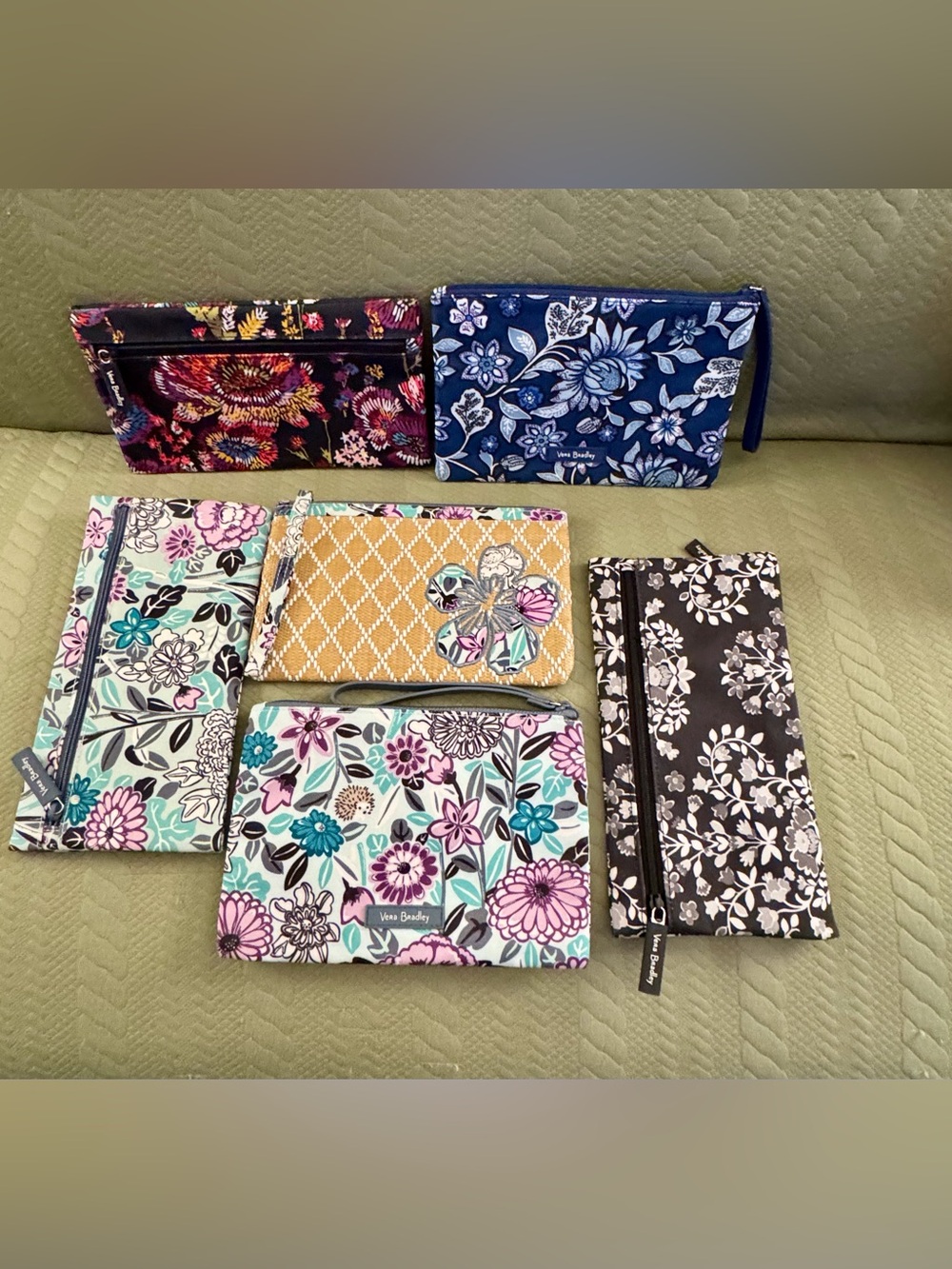 Vera Bradley Set of 8 Pouches NWOT. See pics.
